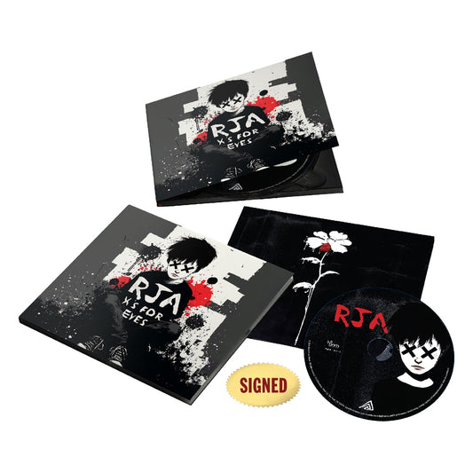 A deluxe CD package for The Red Jumpsuit Apparatus’ X’s For Eyes album, with an illustrated cover, CD, booklet, and gold SIGNED sticker—perfect for fans and available as a limited CD pre-order.